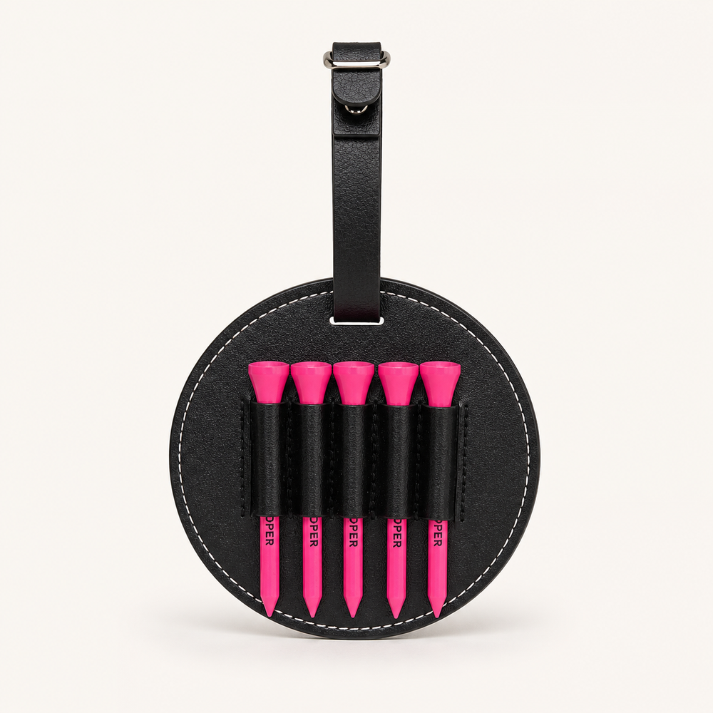 Three round luggage tags in orange, pink, and green with 'Fancy & Proper Golf' branding on a white background.