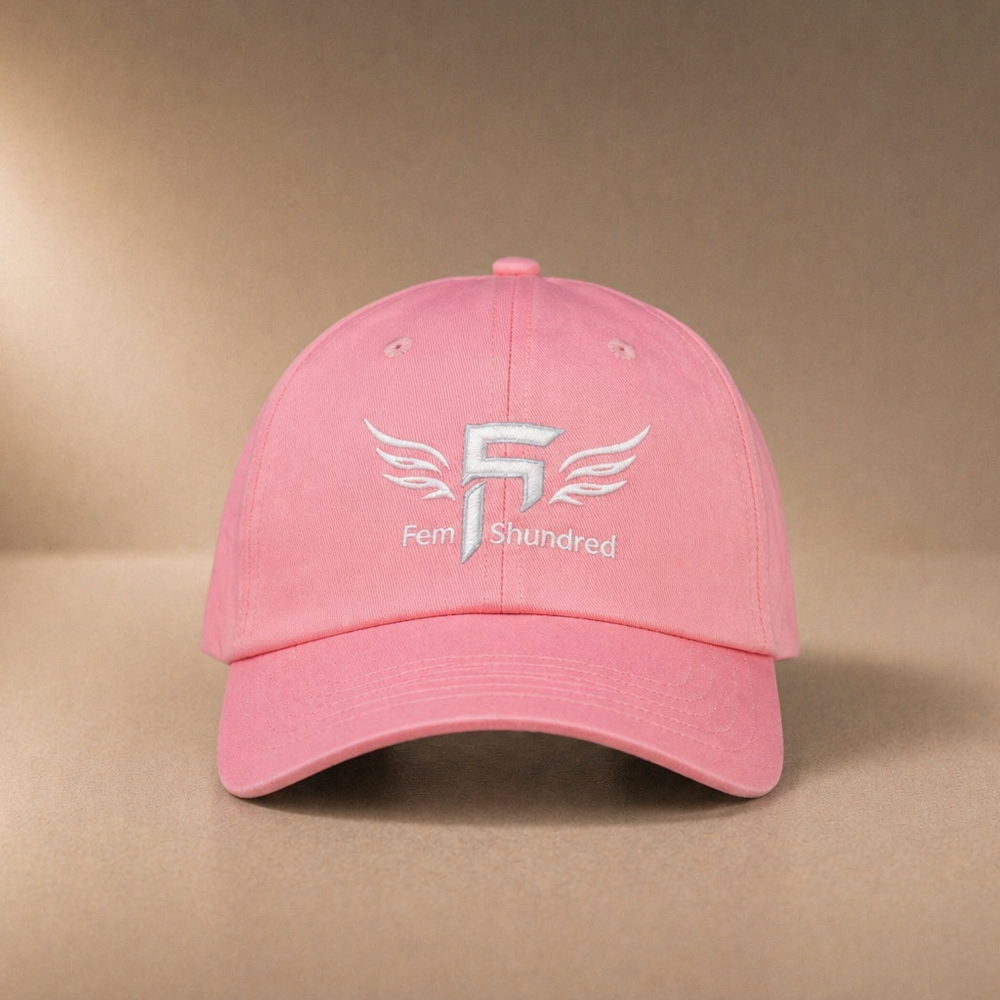 Pink cap with a logo on a beige background