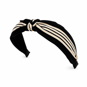 Black and beige striped headband on a white background