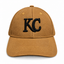 Deeper mustard gold Kansas City cap with soft textured fabric and raised black KC monogram, front view on white