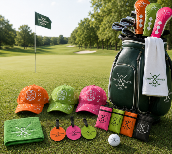 Golf accessories including hats, bags, and balls on a golf course